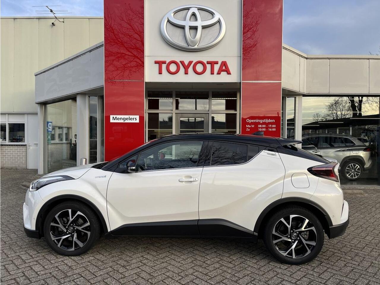 Toyota C-HR 1.8 Hybrid Style Bi-Tone | Rijklaar | NL-Auto | Navi | Stoel en stuurverwarming | Parkeersensoren