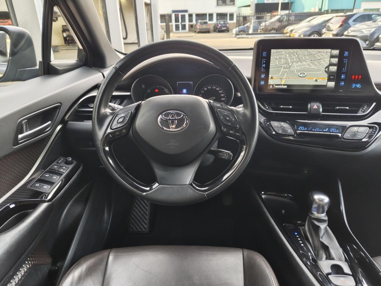 Toyota C-HR 1.8 Hybrid Executive | Navi | Sensoren v/a | Half Leder | Stoelv