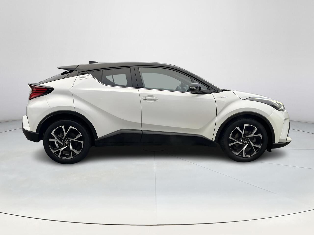 Toyota C-HR 1.8 Hybrid Bi-Tone | Carplay | Dode hoek waarschuwing | Stoelverwarming | Keyless entry |