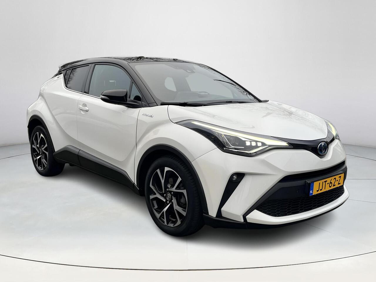 Toyota C-HR 1.8 Hybrid Bi-Tone | Carplay | Dode hoek waarschuwing | Stoelverwarming | Keyless entry |