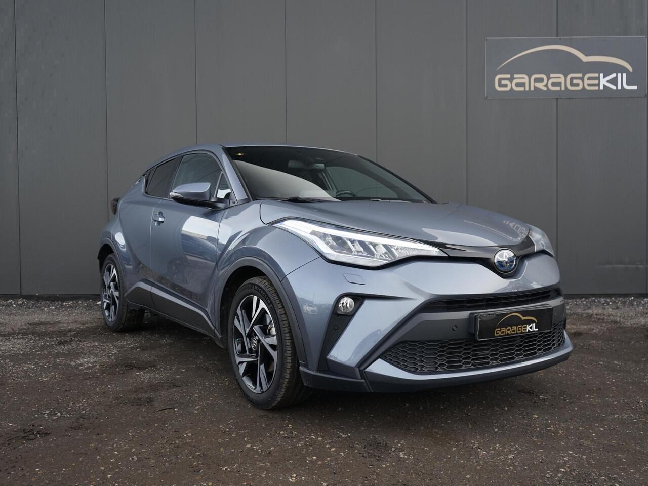 Toyota C-HR 1.8 Hybrid Dynamic Camera / 18'' LM velgen / Stoel+ stuurverw. / Privacy glass / LED / Adap. cruise