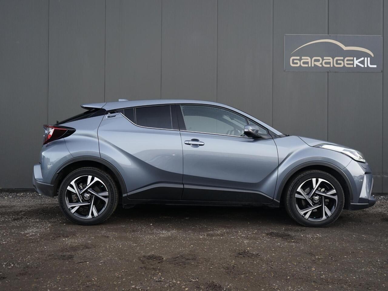 Toyota C-HR 1.8 Hybrid Dynamic Camera / 18'' LM velgen / Stoel+ stuurverw. / Privacy glass / LED / Adap. cruise