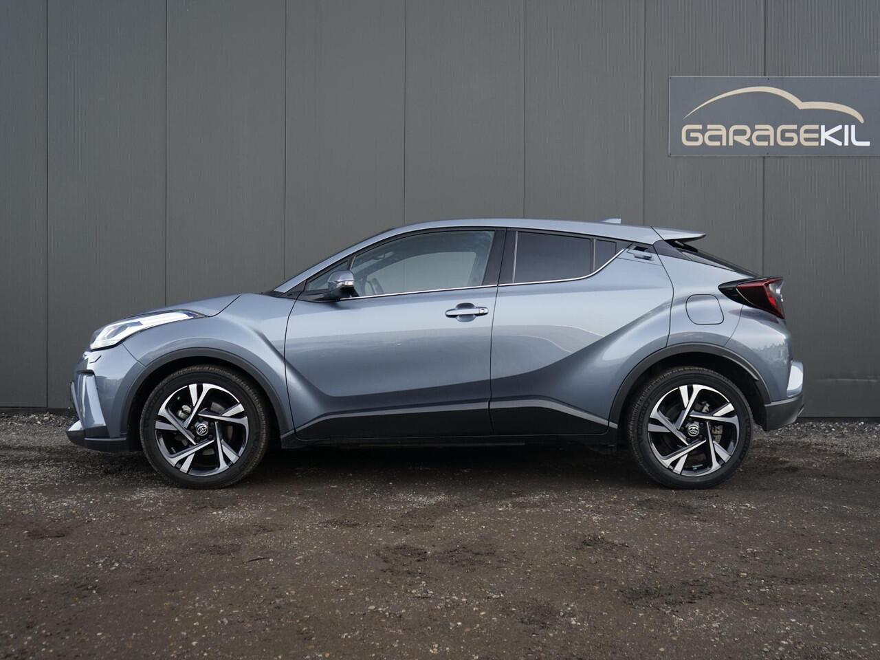 Toyota C-HR 1.8 Hybrid Dynamic Camera / 18'' LM velgen / Stoel+ stuurverw. / Privacy glass / LED / Adap. cruise