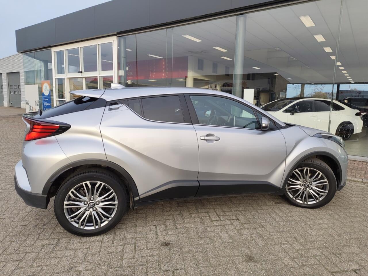 Toyota C-HR 1.8 Hybrid Executive | Navi | Parkeersensoren | Leder/Stoffen be