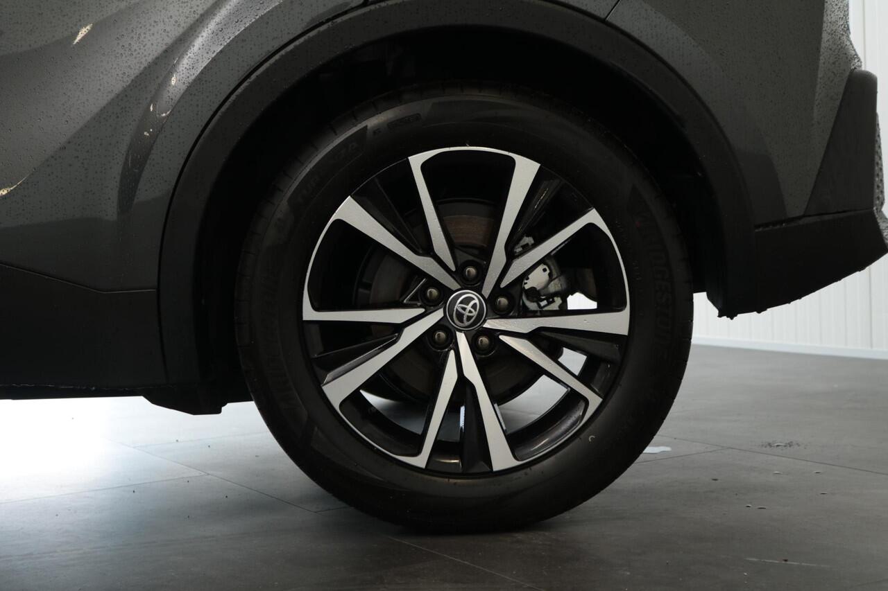 Toyota C-HR 1.8 Hybrid 140 First Edition Bitone, Navi, Carplay , Elek achterklep, Stoelverwarming.