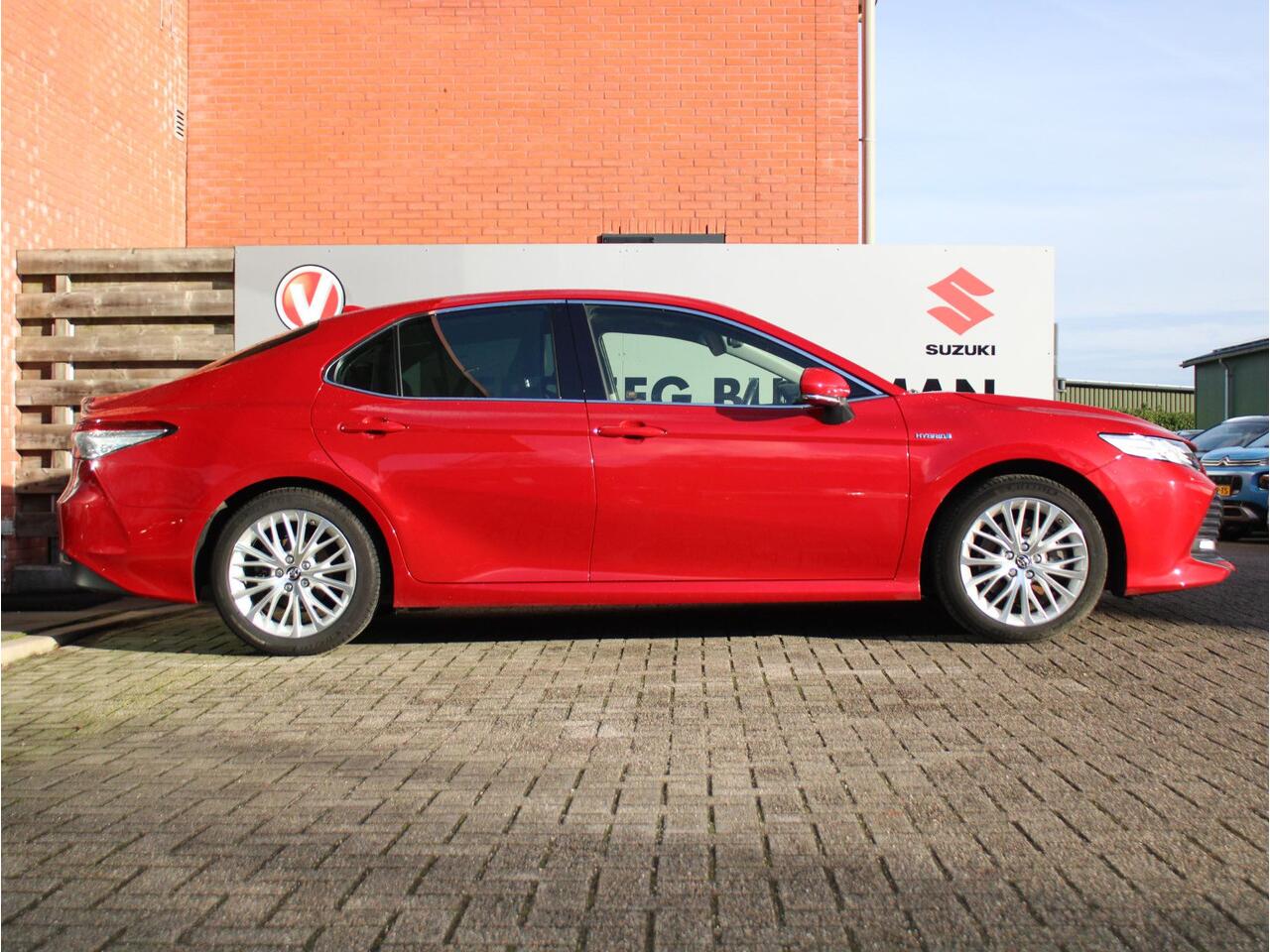 Toyota CAMRY 2.5 Hybrid Premium Automaat Navigatie, Elektrische Stoelverstelling, Parkeersensoren Voor en Achter, JBL Geluidsinstallatie