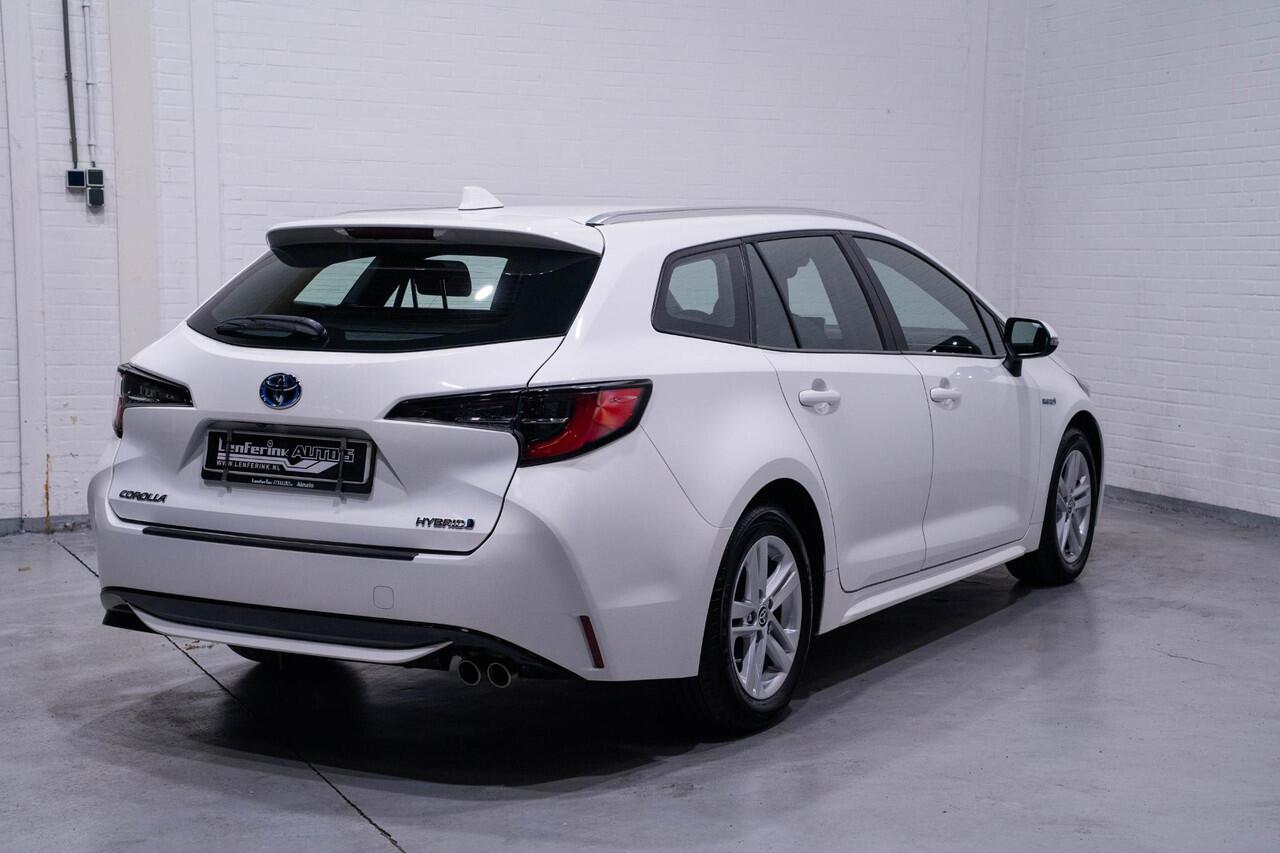 Toyota COROLLA Touring Sports 2.0 Hybrid Dynamic navigatie privateglas afneembare trekhaak allu-dakrail camera multi-stuurbediening service-boekje aanwezig schakelflippers aan het stuur key-less entry en start