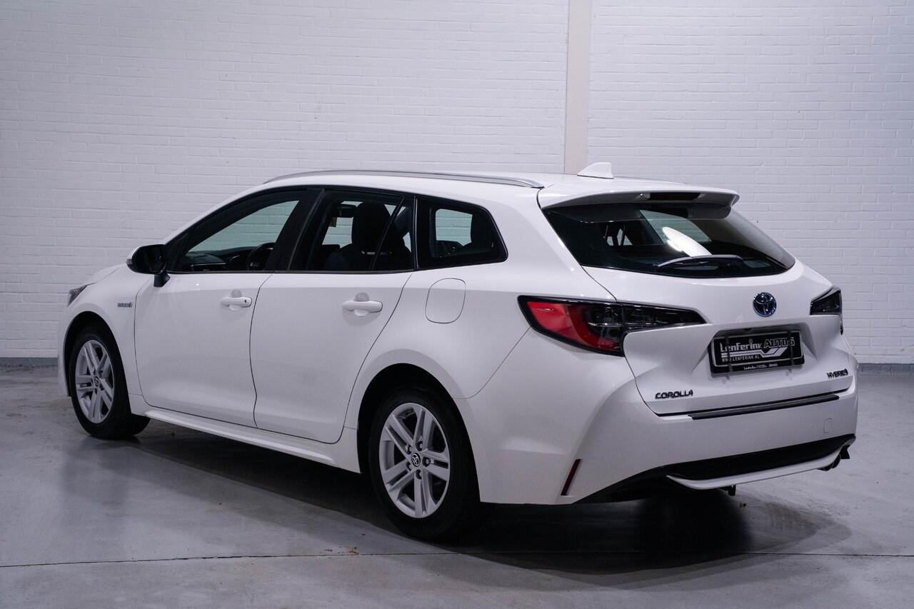 Toyota COROLLA Touring Sports 2.0 Hybrid Dynamic navigatie privateglas afneembare trekhaak allu-dakrail camera multi-stuurbediening service-boekje aanwezig schakelflippers aan het stuur key-less entry en start