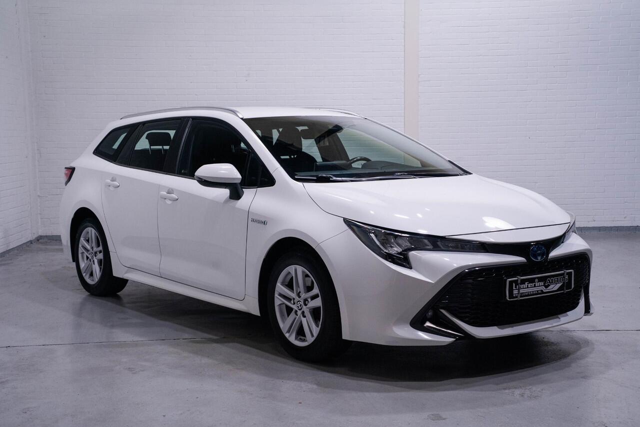 Toyota COROLLA Touring Sports 2.0 Hybrid Dynamic navigatie privateglas afneembare trekhaak allu-dakrail camera multi-stuurbediening service-boekje aanwezig schakelflippers aan het stuur key-less entry en start