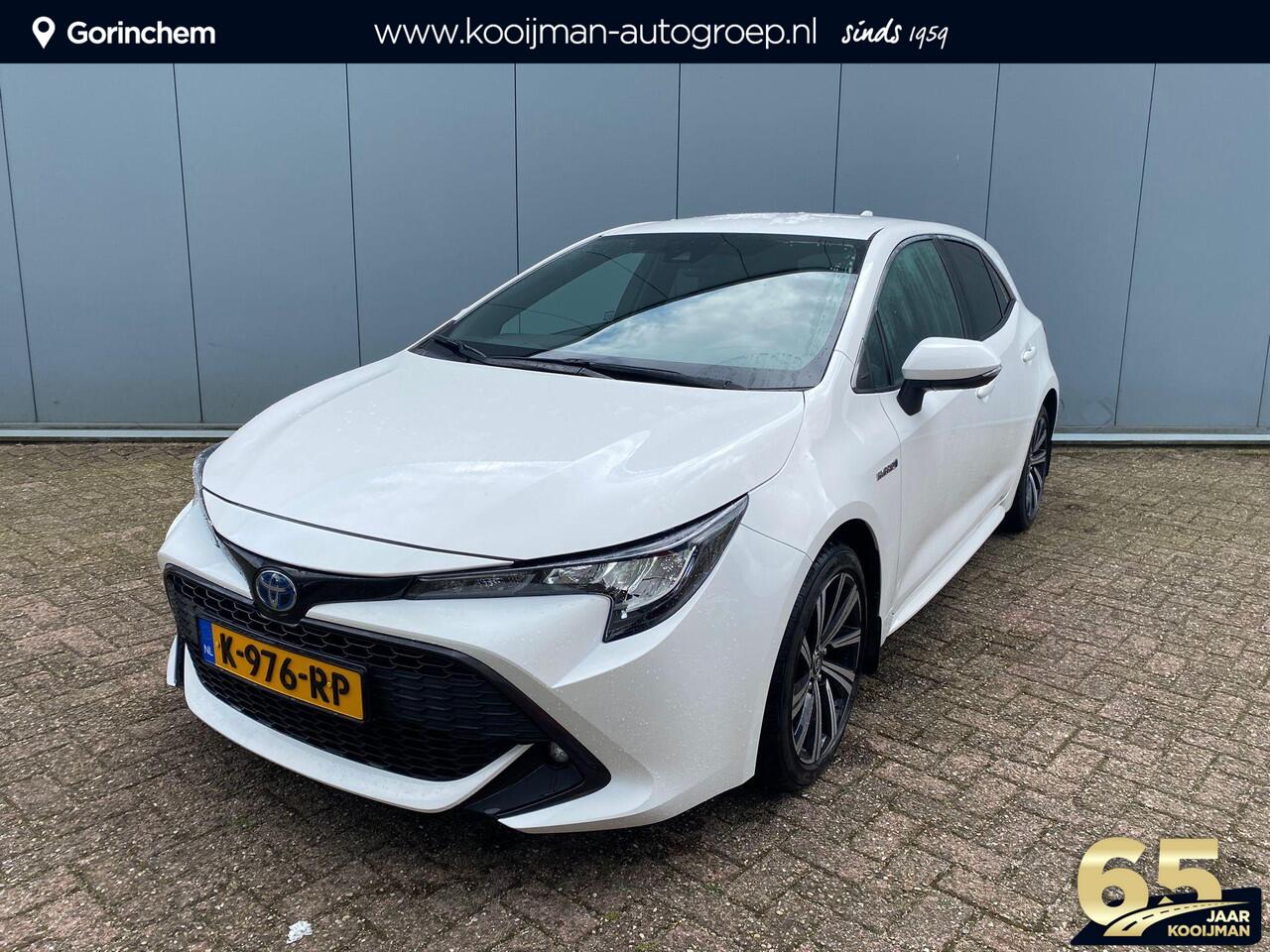 Toyota COROLLA 1.8 Hybrid Dynamic | 1e Eigenaar | NIEUWSTAAT lage KM stand | 10 Jaar Garantie | Dealer onderhouden | Parkeersensoren achter | Full map navigatie | Adaptive cruise control |