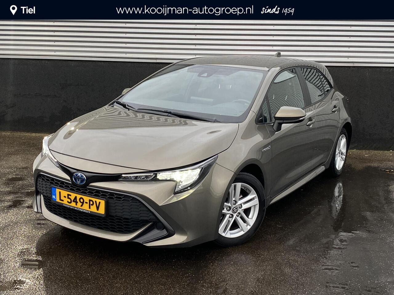 Toyota COROLLA 1.8 Hybrid Active NL Auto, 1e eign. BTW-auto, Navigatie Apple CarPlay/Android Auto, achteruitrij camera, adaptieve cruise control, keyless, boekjes compleet