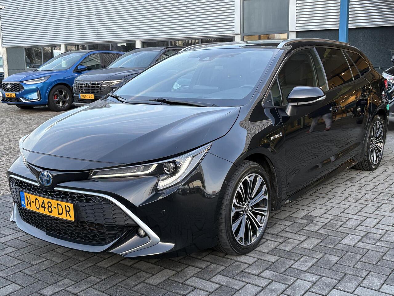 Toyota COROLLA Touring Sports 1.8 Hybrid Executive | Trekhaak | Stoelverwarming | Head-up Display | Camera | Full LED |