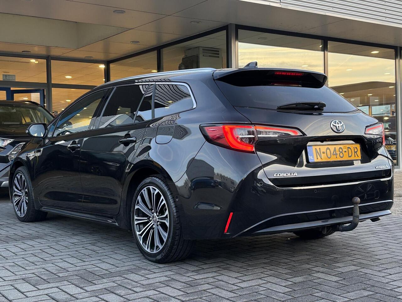 Toyota COROLLA Touring Sports 1.8 Hybrid Executive | Trekhaak | Stoelverwarming | Head-up Display | Camera | Full LED |