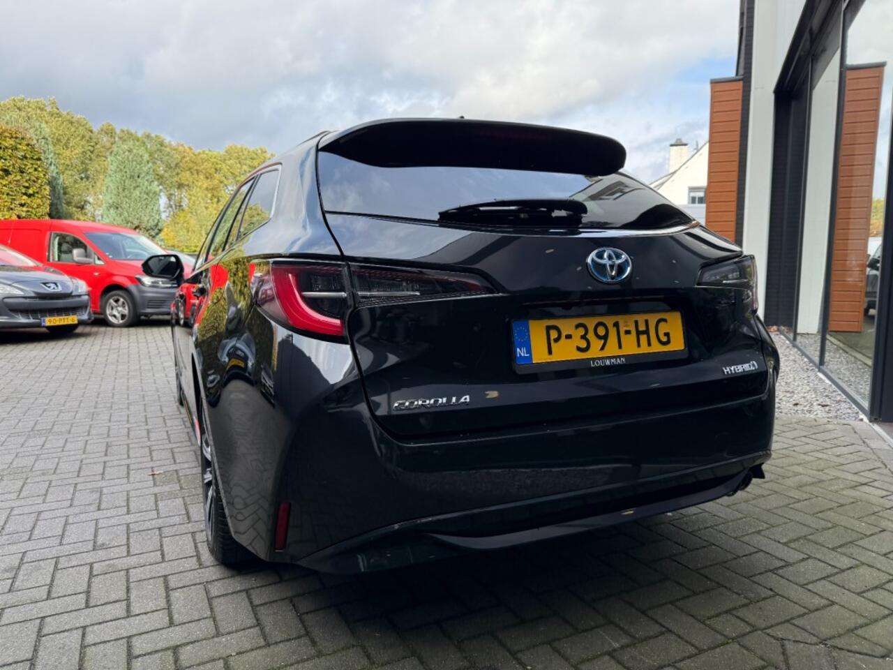 Toyota COROLLA Touring Sports 2.0 153pk Hybrid Business+,LED,Half Leer,Adapt Cruise,Lane Ass.,