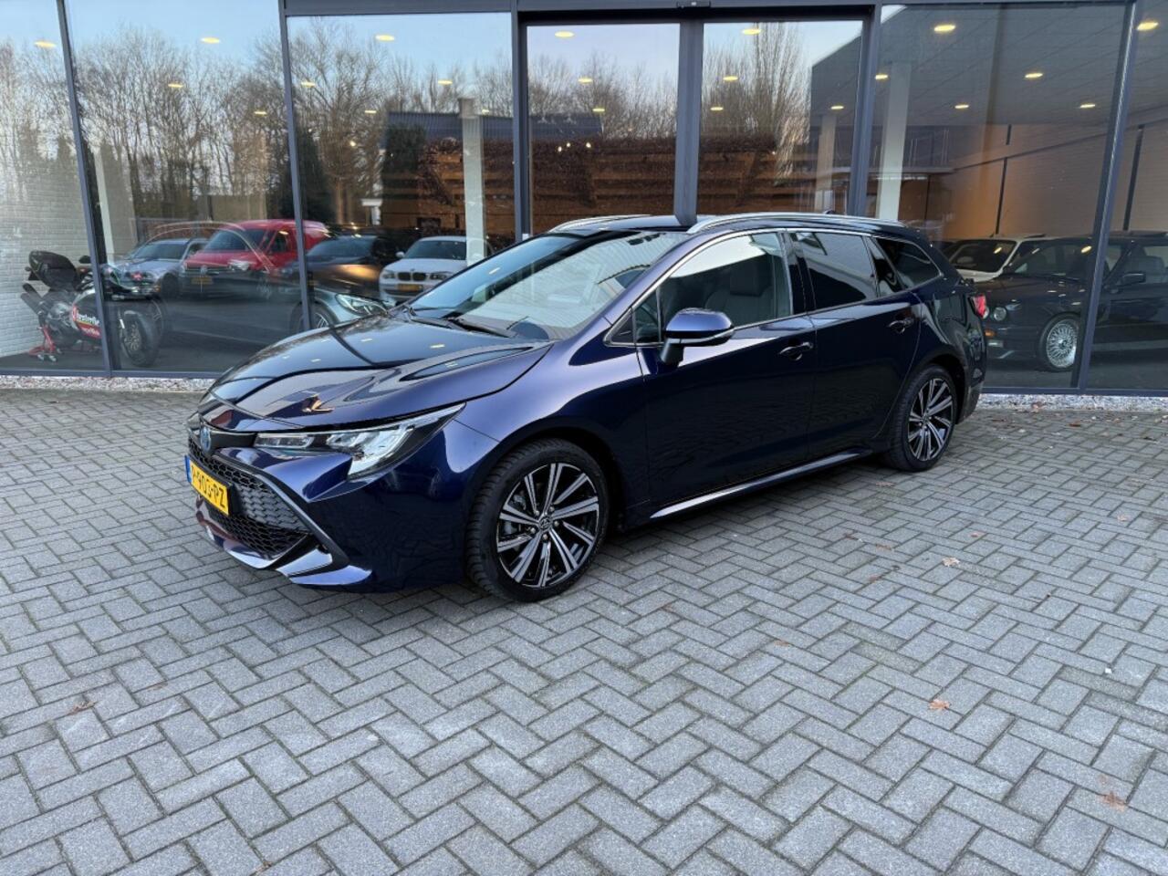 Toyota COROLLA Touring Sports 1.8 Hybrid Business+,Half Leer,LED,Stoelverw,Camera,Adapt Cruise,Navi,Carplay,Lane Ass.,