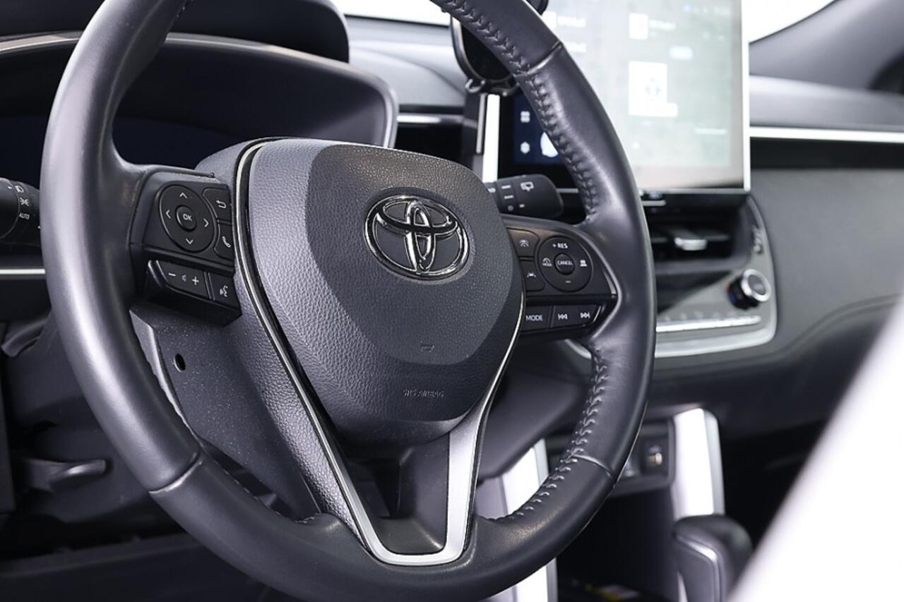 Toyota COROLLA Cross Hybrid 140 Style | Half LEDER | Trekhaak ? 1e Eigenaar