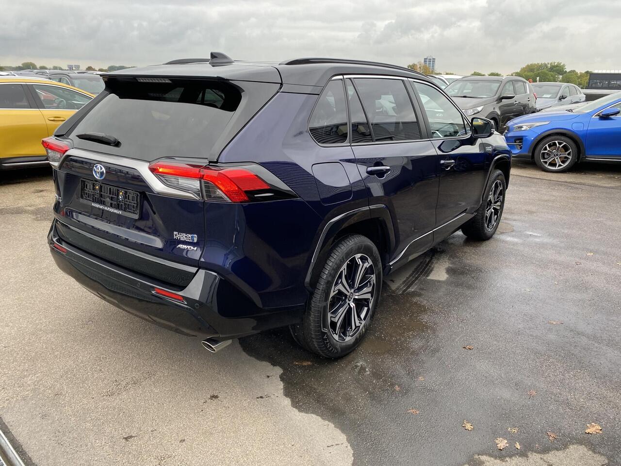 Toyota RAV4 2.5 Plug-in Hybrid AWD Bi-Tone Plus Limited Incl: Dode hoek detectie - AppleCarPlay/AndroidAuto, Stoel en Stuurverwarming, LM velgen, Parkeer hulp camera