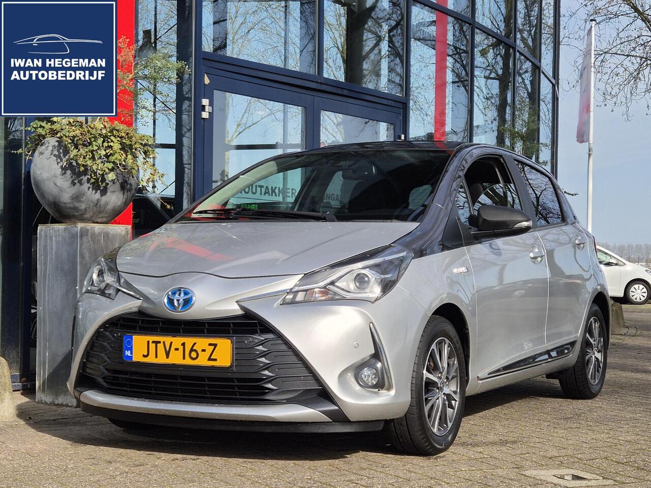 Toyota YARIS 1.5 Hybrid | Navigatie | Lederen bekleding | Schuif/kanteldak | Climate Control | Licht metalen velgen