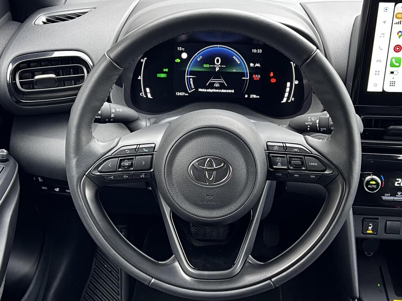 Toyota YARIS Cross 1.5 Hybrid Dynamic Automaat / Fabrieksgarantie tot 04-2028 < 100.000km, tot 10 jaar mogelijk ** / Navigatie (abbo) / Adaptieve CC / Achteruitrijcamera / Apple Carplay Android / 17" LM wielen /