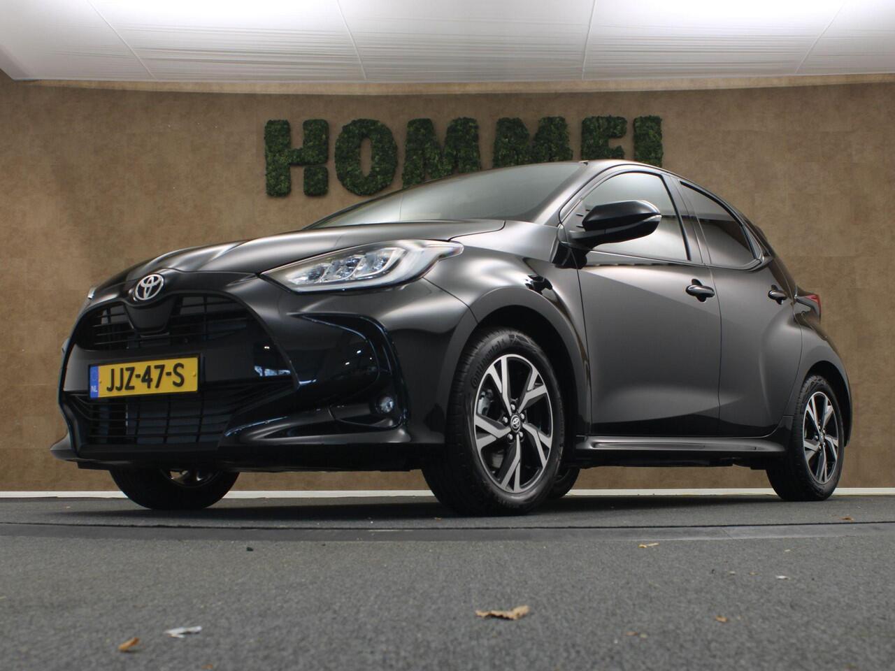 Toyota YARIS 1.5 Hybrid 115 Dynamic - DIRECT UIT VOORRAAD LEVERBAAR - KEYLESS ENTRY & START - STOEL EN STUUR VERWARMING - ADPATIVE CRUISE CONTROL - ACHTERUITRIJ CAMERA - DRAADLOZE TELEFOONLADER