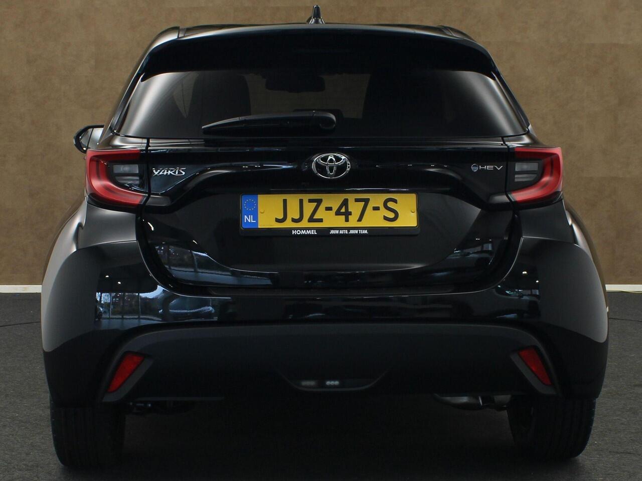 Toyota YARIS 1.5 Hybrid 115 Dynamic - DIRECT UIT VOORRAAD LEVERBAAR - KEYLESS ENTRY & START - STOEL EN STUUR VERWARMING - ADPATIVE CRUISE CONTROL - ACHTERUITRIJ CAMERA - DRAADLOZE TELEFOONLADER