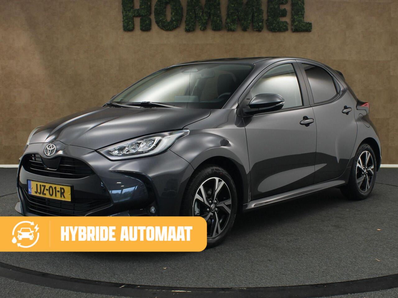 Toyota YARIS 1.5 Hybrid 115 Dynamic - DIRECT UIT VOORRAAD LEVERBAAR - KEYLESS ENTRY & START - STOEL EN STUUR VERWARMING - ADPATIVE CRUISE CONTROL - ACHTERUITRIJ CAMERA - DRAADLOZE TELEFOONLADER