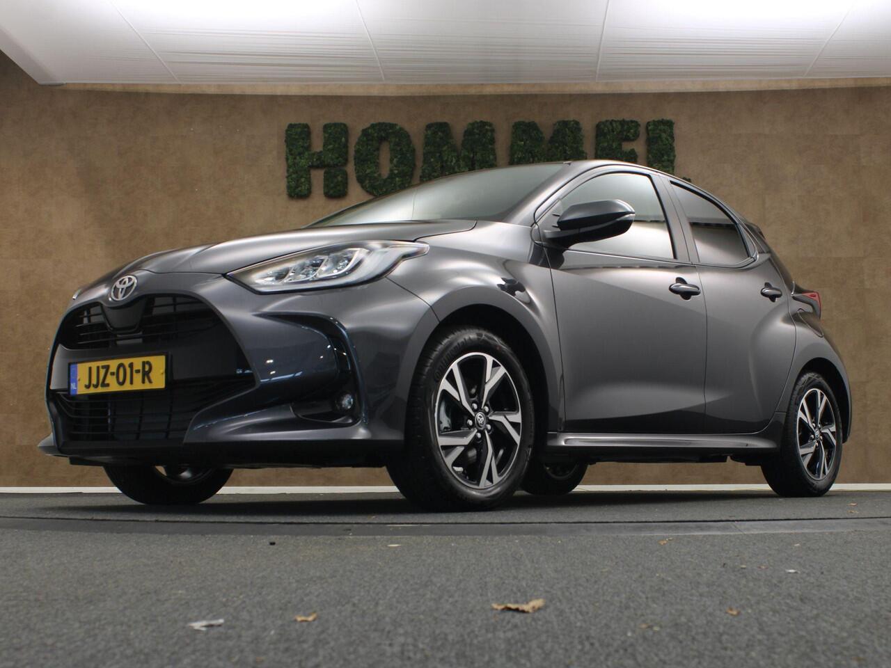 Toyota YARIS 1.5 Hybrid 115 Dynamic - DIRECT UIT VOORRAAD LEVERBAAR - KEYLESS ENTRY & START - STOEL EN STUUR VERWARMING - ADPATIVE CRUISE CONTROL - ACHTERUITRIJ CAMERA - DRAADLOZE TELEFOONLADER