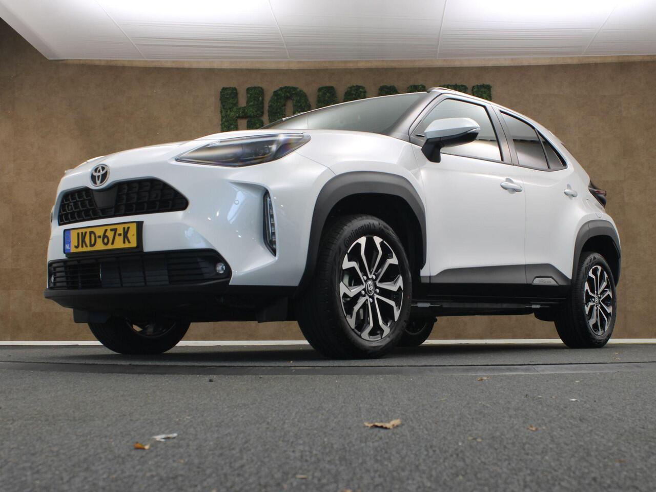 Toyota YARIS Cross 1.5 Hybrid 130 Dynamic 130 PK! - DIRECT UIT VOORRAAD LEVERBAAR - PARKEERSENSOREN VOOR EN ACHTER - DODEHOEK DETECTIE - STOEL, STUUR EN VOORRUIT VERWARMING - DRAADLOZE TELEFOONLADER - ADAPTIVE CRUISE CONTROL