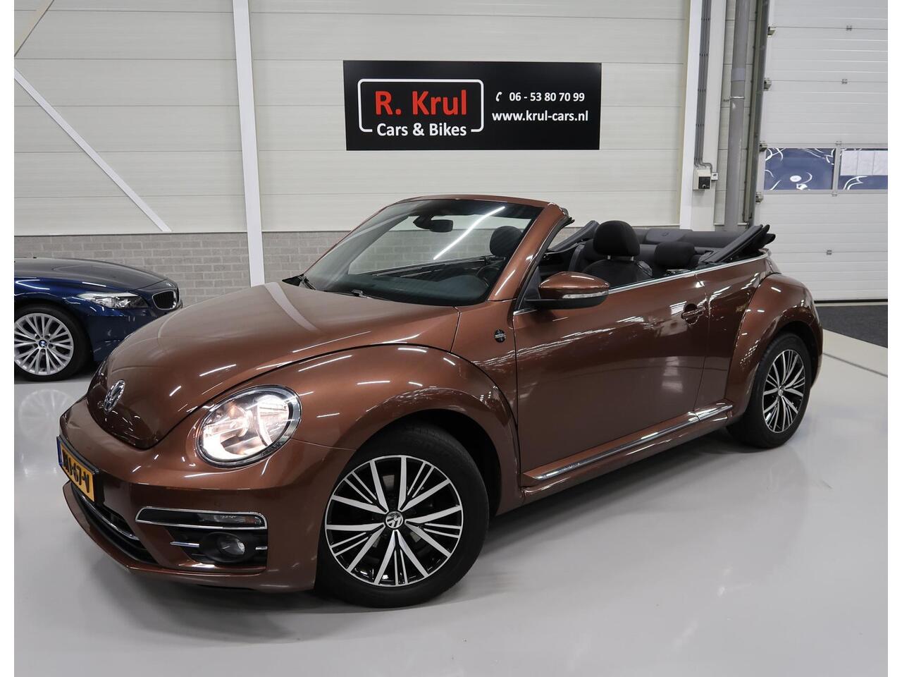 Volkswagen BEETLE (NEW) Cabriolet 1.2 TSI Sound 2018 Airco-ecc Navigatie App connect Stoelverwarming Windscherm 1e Eigenares Dealer onderhouden 17 inch Sportvelgen Zeer nette staat Dark Bronze metallic