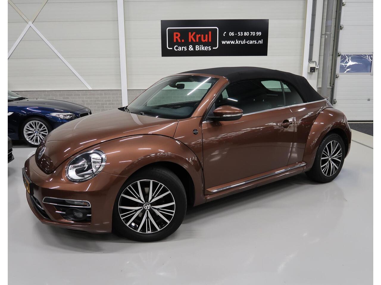 Volkswagen BEETLE (NEW) Cabriolet 1.2 TSI Sound 2018 Airco-ecc Navigatie App connect Stoelverwarming Windscherm 1e Eigenares Dealer onderhouden 17 inch Sportvelgen Zeer nette staat Dark Bronze metallic