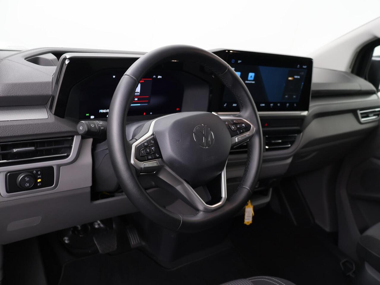 Volkswagen E-Transporter 32 L2H1 Bulli 64 kWh 210 kW (286 pk) DEMO | IQ lights | Navigatie Apple/Andriod carplay | Trekhaak vast | Achteruitrijcamera | Adaptive Cruise Control | Digitaal Dasboard