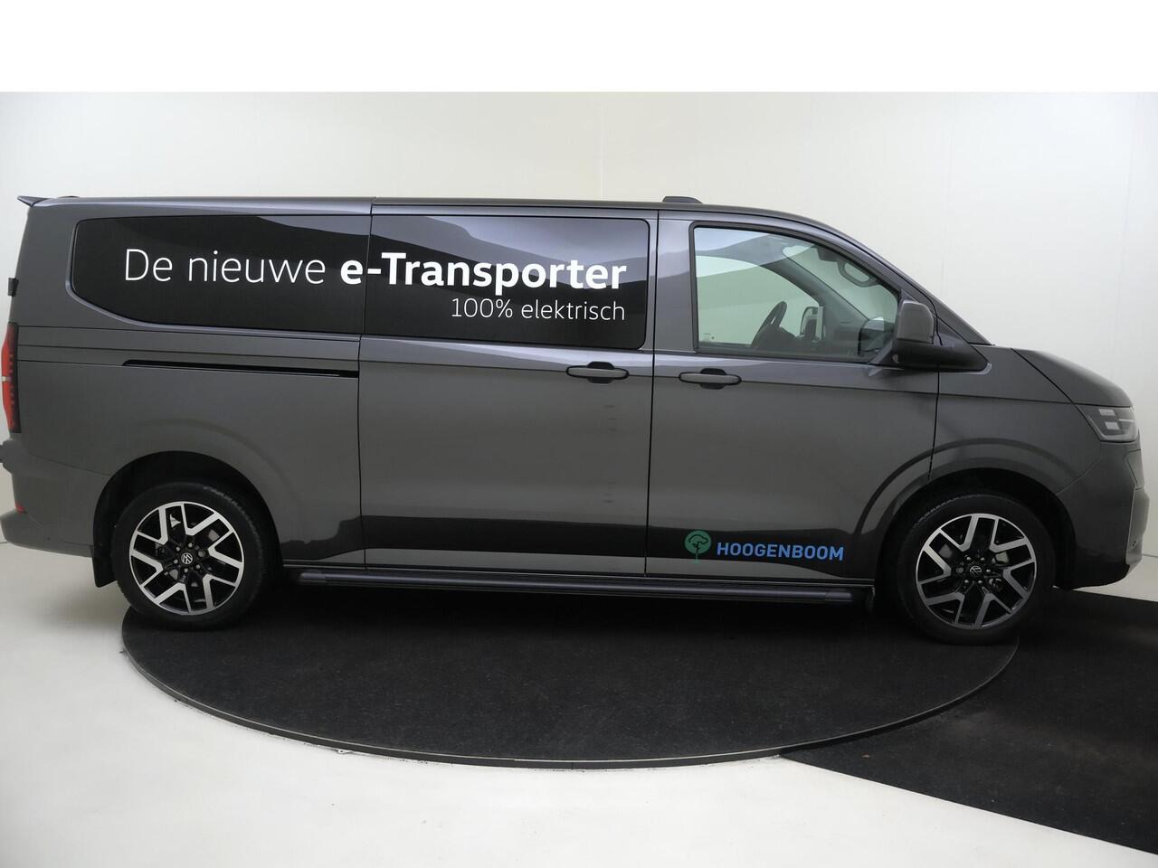 Volkswagen E-Transporter Bedrijfswagens Style Intro L2 210 kW (286 pk) Elektromotor | Adaptieve Cruise Control | Trekhaak | Navigatiesysteem 13" met draadloos App-Connect | IQ.LIGHT - LED matrix koplampen | Geavanceerde grootlichtregeling (Dynamic Light Assist) |