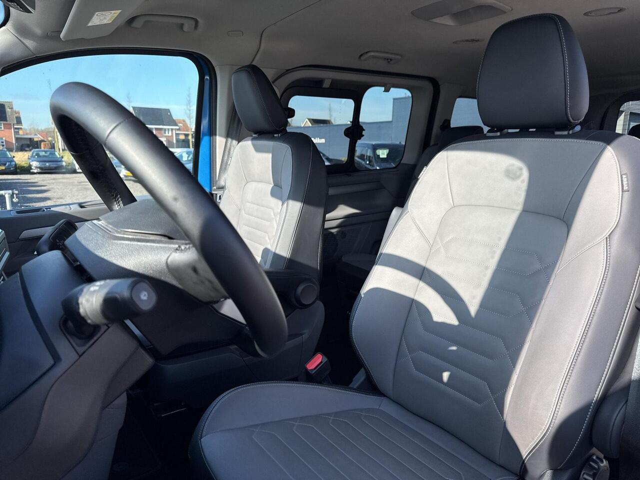 Volkswagen E-Transporter Caravelle 32 L2H1 Style 64 kWh | Trekhaak | Leder | 8 Pers. | H&K Audio |