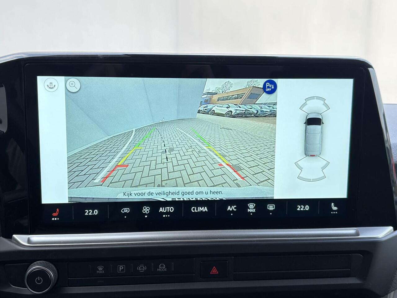 Volkswagen E-Transporter Caravelle 32 L1H1 Life 64 kWh Automaat / NIEUW/ Fabrieksgarantie tot 12-2027 / 8 Persoons / WLTP 305 km / Stone Gray / Warmtepomp / Apple Carplay/Android Auto / Licht en zicht-pakket / Keyless entry / draadloze telefoonlader /