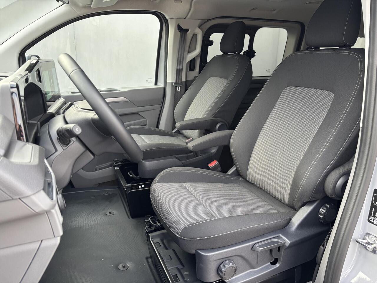 Volkswagen E-Transporter Caravelle 32 L1H1 Life 64 kWh Automaat / NIEUW/ Fabrieksgarantie tot 12-2027 / 8 Persoons / WLTP 305 km / Stone Gray / Warmtepomp / Apple Carplay/Android Auto / Licht en zicht-pakket / Keyless entry / draadloze telefoonlader /