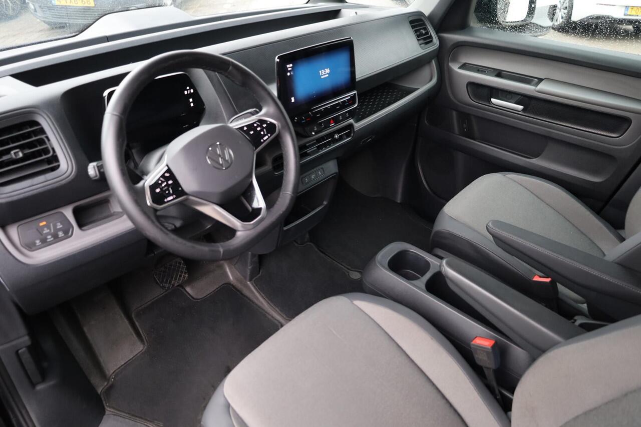 Volkswagen ID. Buzz Cargo 77 kWh 2 x schuifdeur trekhaak wegklapbaar led matrix multimedia pakket plus stuurwielverwarming multifunctioneel met leder voorstoelen verwarmbaar voorruit verwarmbaar bindrails laadruimte laadvloer park assist achterdeuren 20" Solna velgen 2 x voorstoel