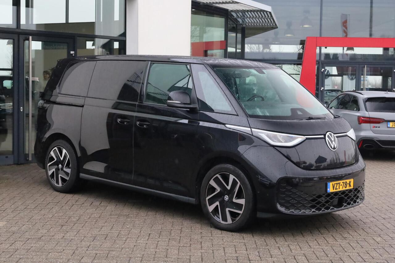 Volkswagen ID. Buzz Cargo 77 kWh 2 x schuifdeur trekhaak wegklapbaar led matrix multimedia pakket plus stuurwielverwarming multifunctioneel met leder voorstoelen verwarmbaar voorruit verwarmbaar bindrails laadruimte laadvloer park assist achterdeuren 20" Solna velgen 2 x voorstoel
