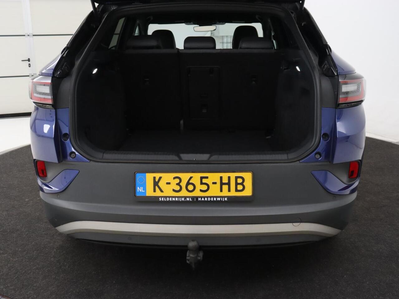 Volkswagen ID.4 First 77 kWh | Trekhaak | Stoel & stuurverwarming | Adaptive cruise | Camera | Carplay | Half leder | Navigatie | 20'' | Full LED | Keyless | Climate control | Sfeerverlichting