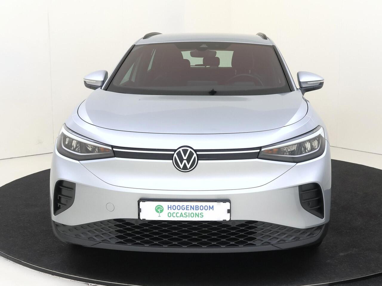 Volkswagen ID.4 Life 77 kWh | Navigatie | Adaptieve cruise control | Stoelverwarming | Parkeersensoren | CarPlay | Elektrisch inklapbare buitenspiegels | Voorklimatisering |