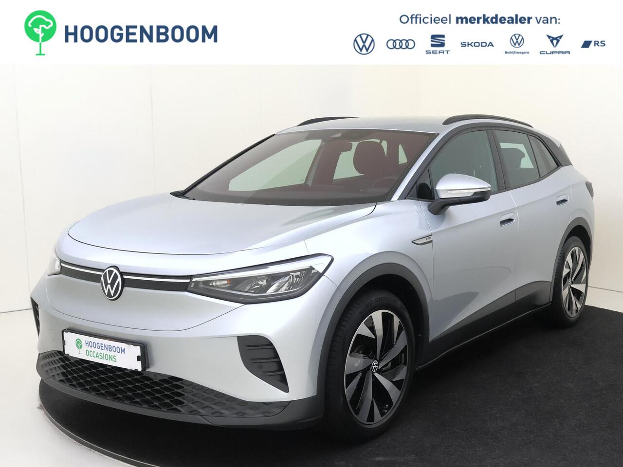 Volkswagen ID.4 Life 77 kWh | SoH 90% | Navigatie | Adaptieve cruise control | Stoelverwarming | Parkeersensoren | CarPlay | Elektrisch inklapbare buitenspiegels | Voorklimatisering |