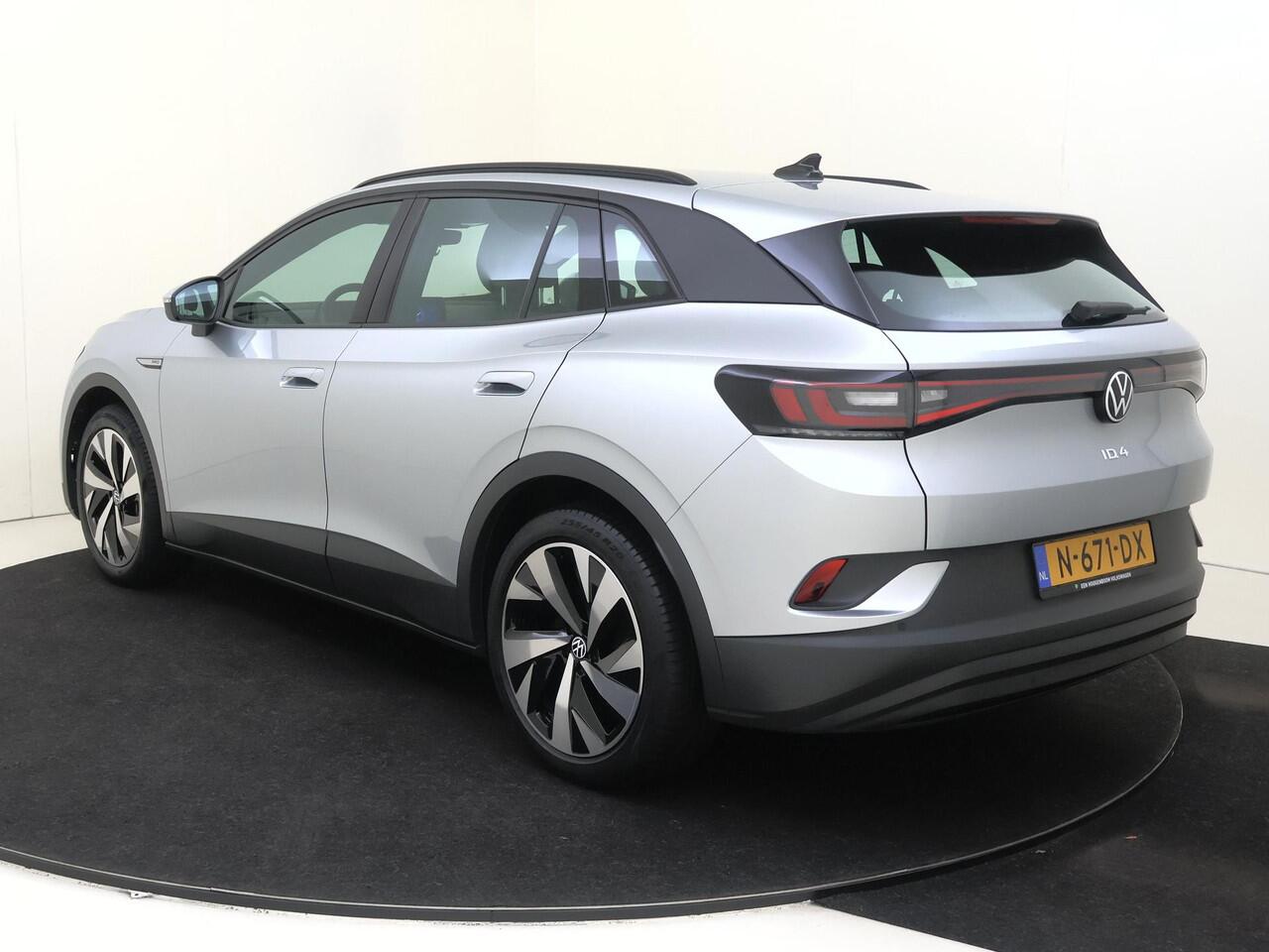 Volkswagen ID.4 Life 77 kWh | SoH 90% | Navigatie | Adaptieve cruise control | Stoelverwarming | Parkeersensoren | CarPlay | Elektrisch inklapbare buitenspiegels | Voorklimatisering |