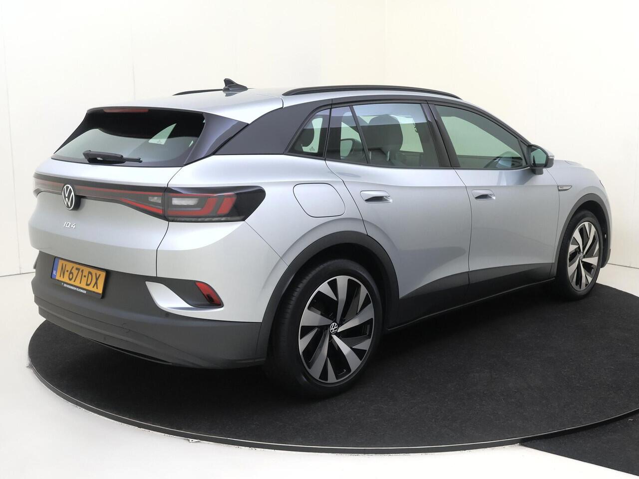 Volkswagen ID.4 Life 77 kWh | SoH 90% | Navigatie | Adaptieve cruise control | Stoelverwarming | Parkeersensoren | CarPlay | Elektrisch inklapbare buitenspiegels | Voorklimatisering |