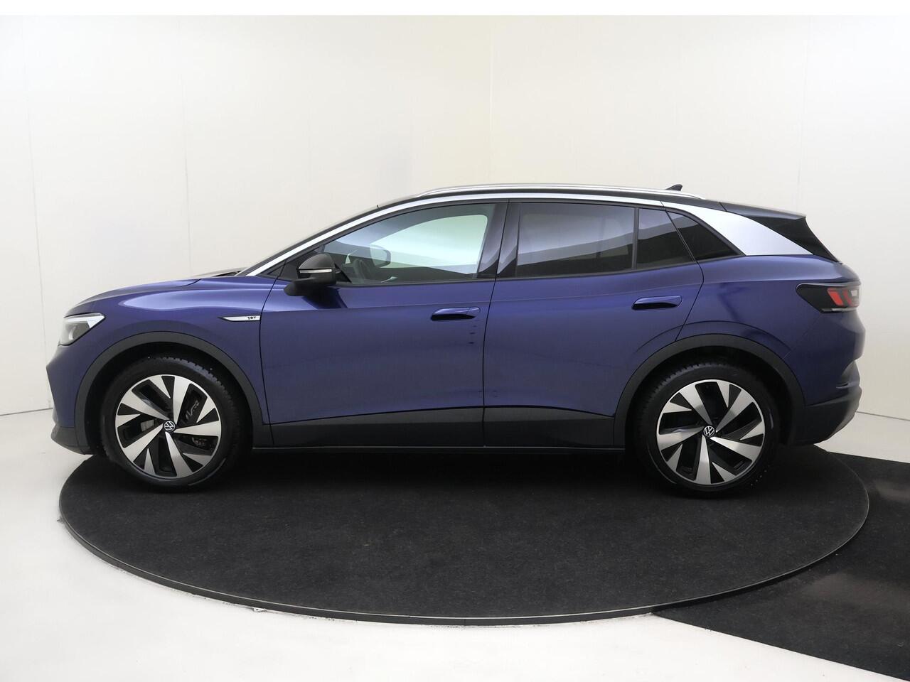 Volkswagen ID.4 Pro 77 kWh | Achteruitrijcamera | SoH 89%| Stoelverwarming | Luxe bekleding | Adaptieve cruise control | Navigatie | CarPlay | Sfeerverlichting |