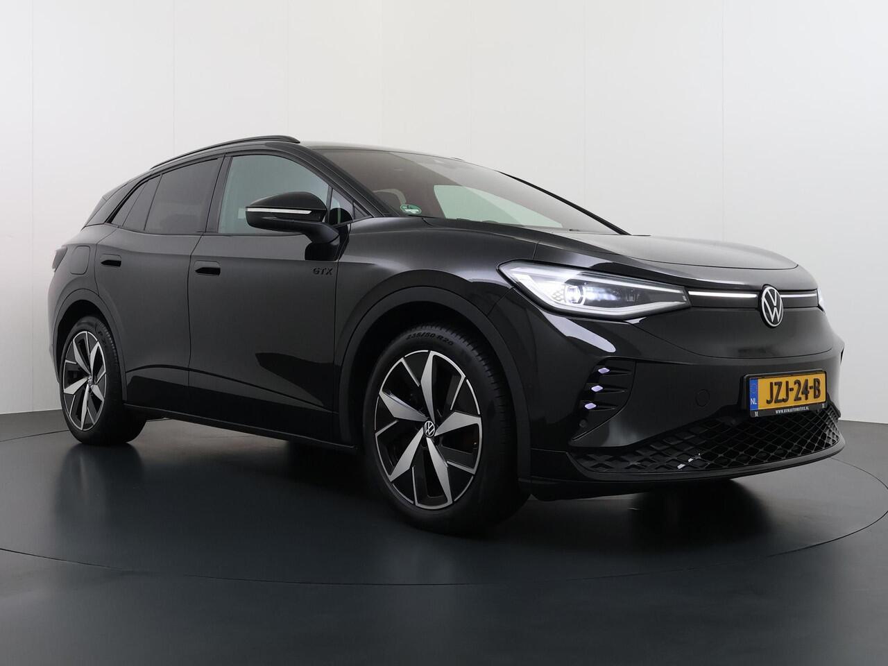 Volkswagen ID.4 GTX 4Motion 77 kWh VAN ¤34.900,- NU VOOR SLECHTS ¤30.877,- Uw LENTEVOORDEEL ¤4.023,-!300PK | SOH 89% | WARMTEPOMP | HEADUP DISPLAY | ACC CRUISE CONTROLE | ELECTRISCHE TREKHAAK | MATRIX-LED-KOPLAMP (IQ.LIGHT) | STOEL + STUURWIELVERWARMING | RIJKLAAR GELEV