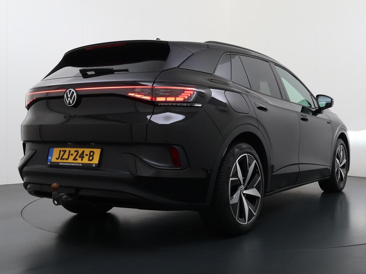 Volkswagen ID.4 GTX 4Motion 77 kWh VAN ¤34.900,- NU VOOR SLECHTS ¤30.877,- Uw LENTEVOORDEEL ¤4.023,-!300PK | SOH 89% | WARMTEPOMP | HEADUP DISPLAY | ACC CRUISE CONTROLE | ELECTRISCHE TREKHAAK | MATRIX-LED-KOPLAMP (IQ.LIGHT) | STOEL + STUURWIELVERWARMING | RIJKLAAR GELEV