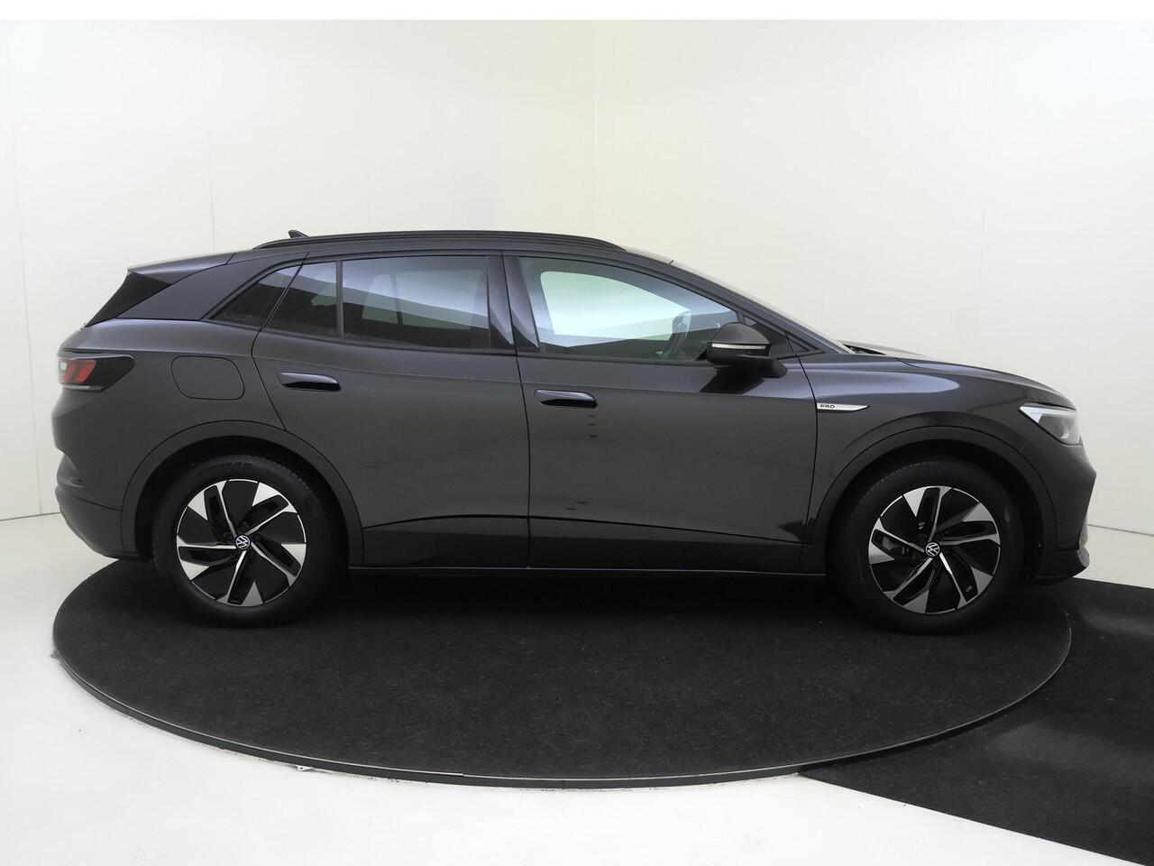 Volkswagen ID.4 Pro 77 kWh | Parkeersensoren | Adaptieve cruise control | CarPlay | Navigatie | Stoel- en stuurwielverwarming | Electronic climate control |