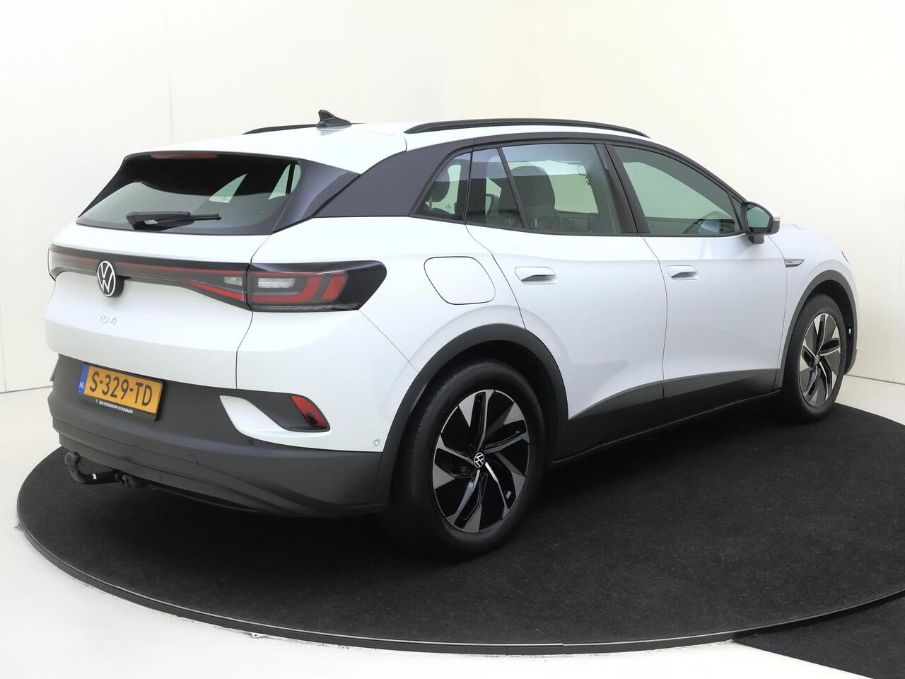 Volkswagen ID.4 Pro 77 kWh | SoH 90% | Trekhaak | Achteruitrijcamera | Keyless | Electronic climate control | Adaptieve cruise control | CarPlay | Stoel- en stuurwielverwarming | Navigatie |