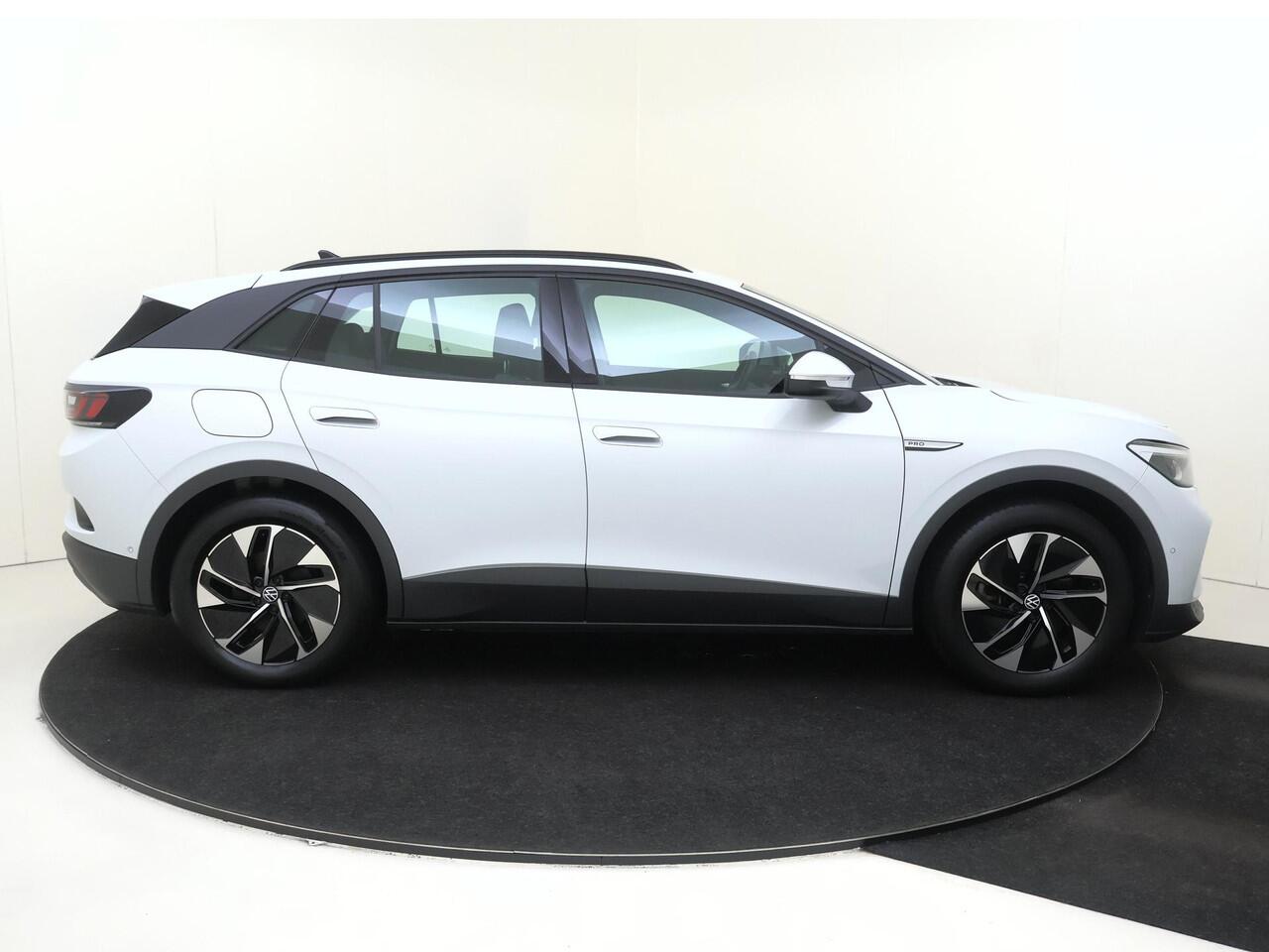 Volkswagen ID.4 Pro 77 kWh | SoH 90% | Trekhaak | Achteruitrijcamera | Keyless | Electronic climate control | Adaptieve cruise control | CarPlay | Stoel- en stuurwielverwarming | Navigatie |