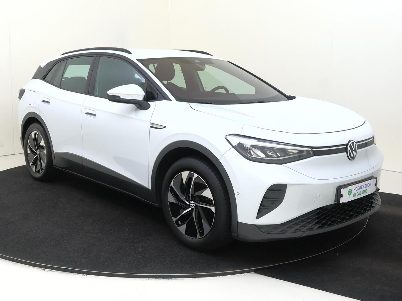 Volkswagen ID.4 Pro 77 kWh | SoH 90% | Trekhaak | Achteruitrijcamera | Keyless | Electronic climate control | Adaptieve cruise control | CarPlay | Stoel- en stuurwielverwarming | Navigatie |