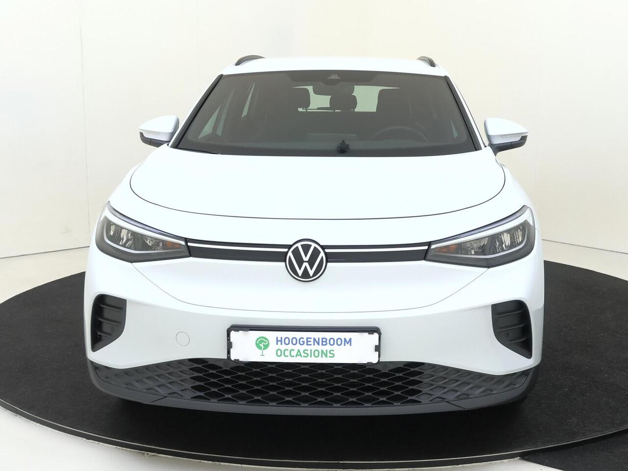 Volkswagen ID.4 Pure 52 kWh | SoH 91% | Parkeersensoren | 3-zone airco | Adaptieve cruise control | Climate Control | Stoel- en stuurwielverwarming | CarPlay | Navigatie |